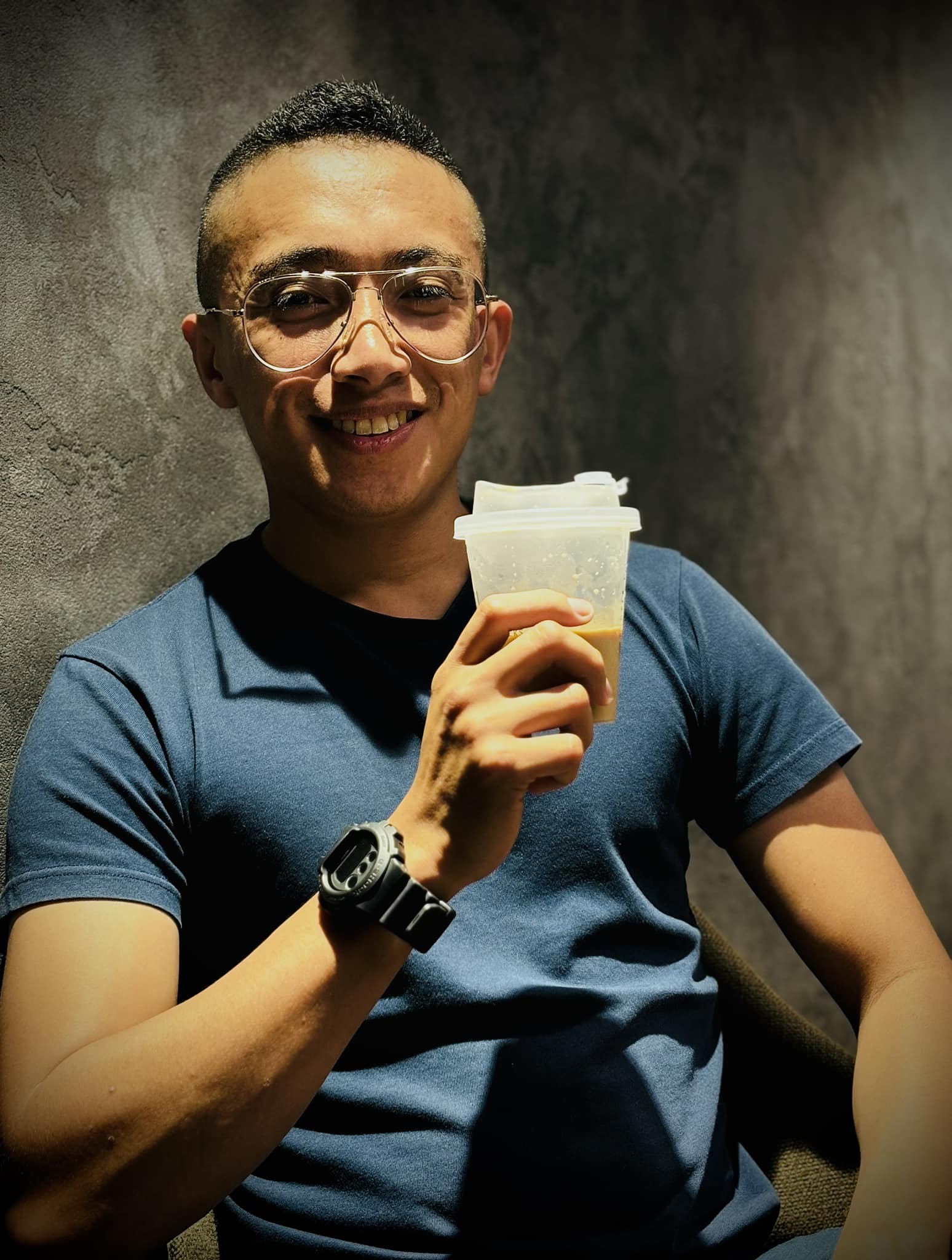 Owner Holding Coffee